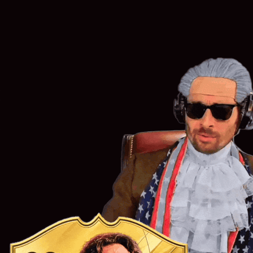 Man in Wig Holding 99 Card