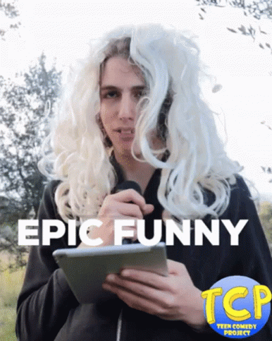 Man in Wig Holding Tablet Saying Epic Funny