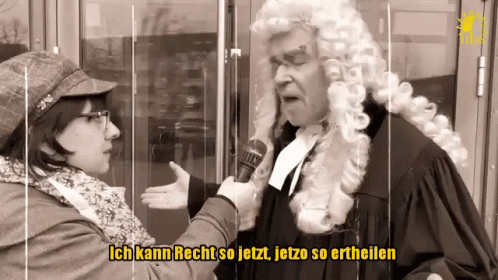 Man in Wig Interviewed by Woman Ich Kann Recht So Jetzt Jetzo So Ertheilen