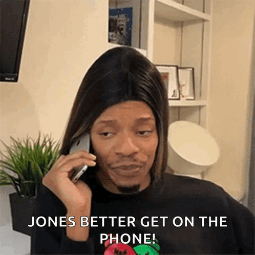 Man In Wig Talking On Phone GIF