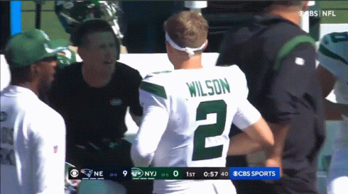 Man In Wilson Number 2 Jersey Talks To Coach GIF