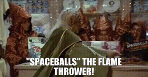 Man in Witch Costume Throwing Spaceball