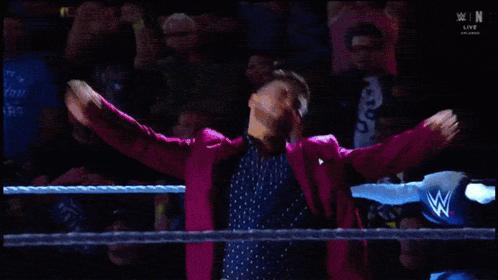 Man In Wrestling Ring Arms Outstretched GIF