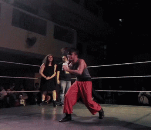 Man in Wrestling Ring Taraaa