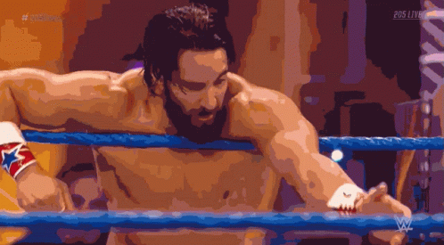 Man in Wrestling Ring with 205 Live