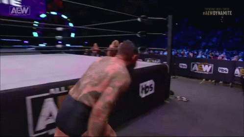 Man In Wrestling Ring With AEW Logo GIF