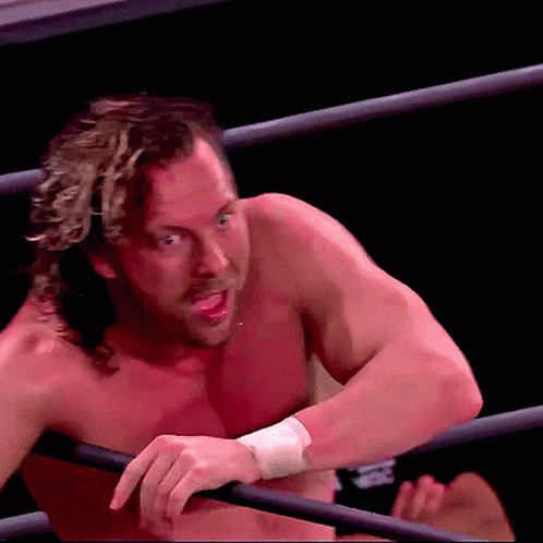 Man in Wrestling Ring with Bandage Saying R