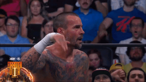 Man in Wrestling Ring With Broken Door