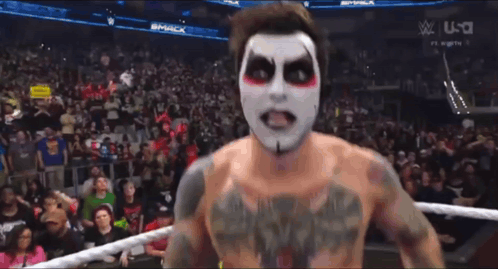 Man in Wrestling Ring With Smack Logo