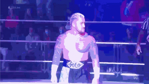 Man in Wrestling Ring with Solo Belt