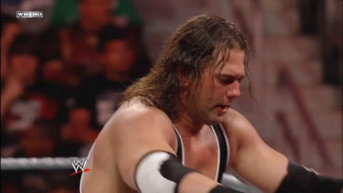 Man in Wrestling Ring with W