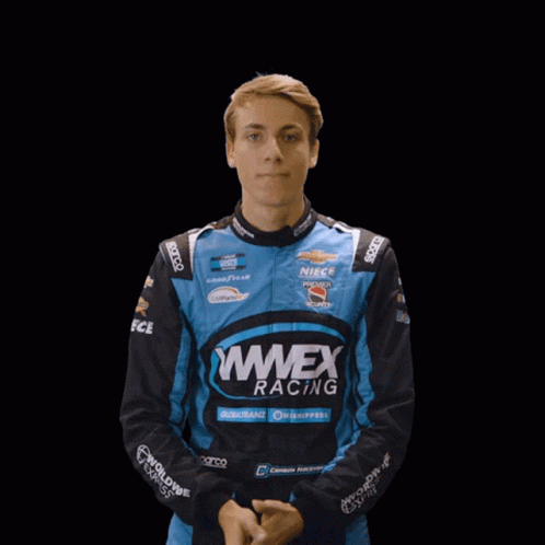 Man In Wweex Racing Jacket With Eyes Closed GIF