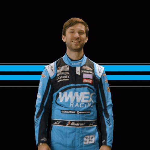 Man in WWEx Racing Uniform Fist Pump