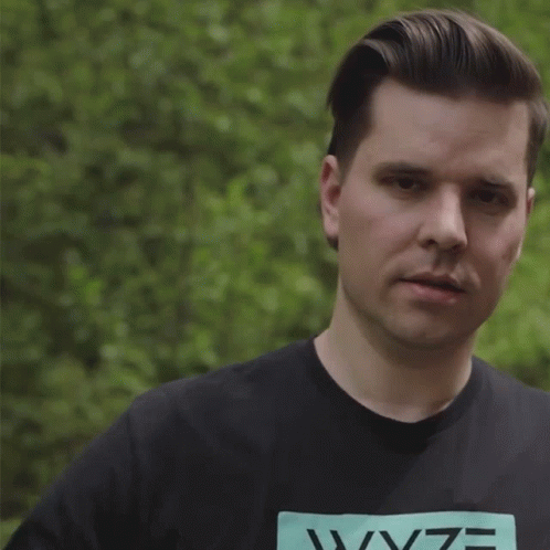 Man in Wyze T-Shirt Making Gesture