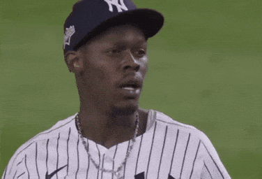 Man In Yankees Hat Scratching Head GIF