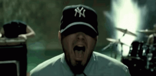 Man In Yankees Hat Sticking Tongue Out GIF