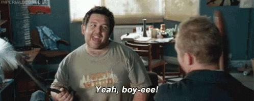 Man In Yeah Boy-Eee Shirt Holding Sword GIF