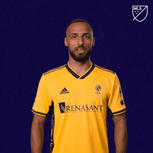 Man in Yellow Adidas Shirt Saying Renaissance