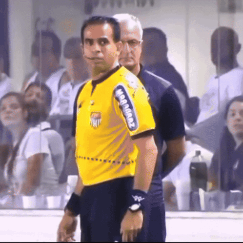 Man in Yellow Allianz Shirt