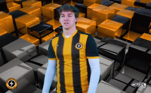 Man In Yellow And Black Striped Shirt With Lightning Bolt GIF