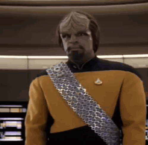 Man in Yellow and Black Uniform