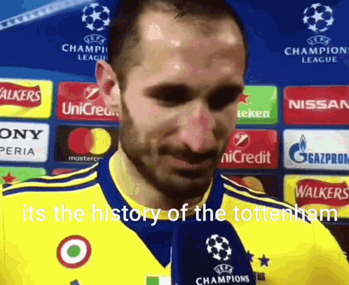Man in Yellow and Blue Jersey Says Tottenham History