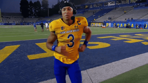 Man in Yellow and Blue San Jose State Jersey