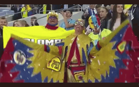Man in Yellow Costume With Trump Flag