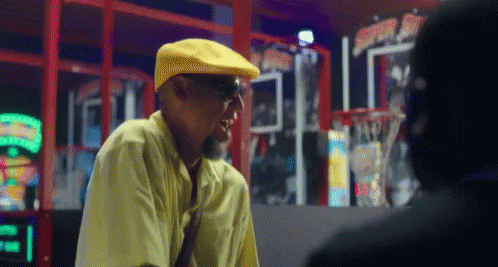 Man In Yellow Hat Talking To Man GIF