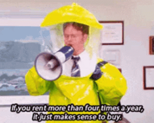Man in Yellow Hazmat Suit Holding Megaphone