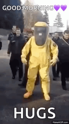 Man in Yellow Hazmat Suit Walking