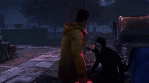 Man in Yellow Jacket Holding Red First Aid Kit Next to Scream