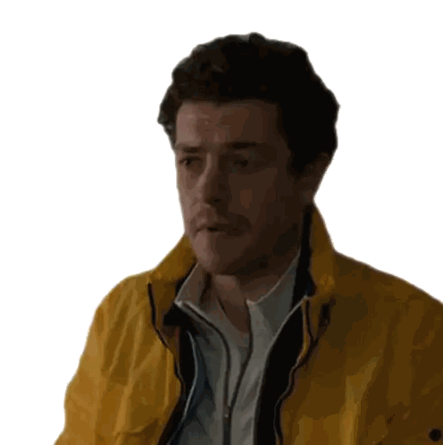 Man In Yellow Jacket Looking At Camera
