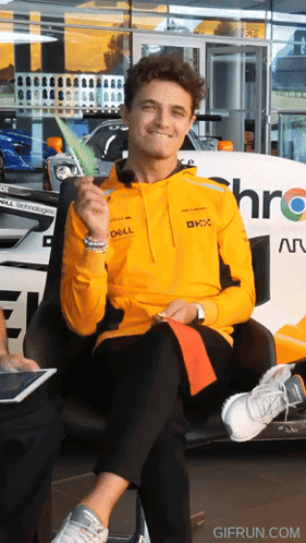Man in Yellow Jacket Saying Dell