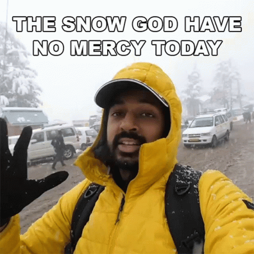 Man In Yellow Jacket Says Snow God Have No Mercy Today GIF