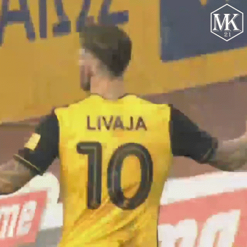 Man in Yellow Jersey Number 10
