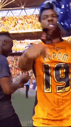 Man In Yellow Jersey Number 19 GIF