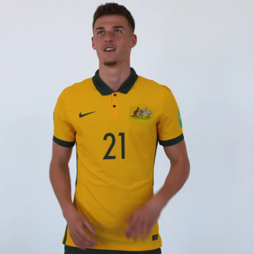 Man In Yellow Jersey Number 21 GIF