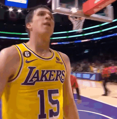 Man In Yellow Lakers Jersey Number 15 GIF