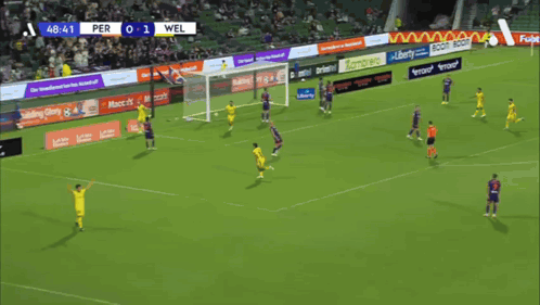 Man In Yellow OPPO Jersey Running On Soccer Field GIF
