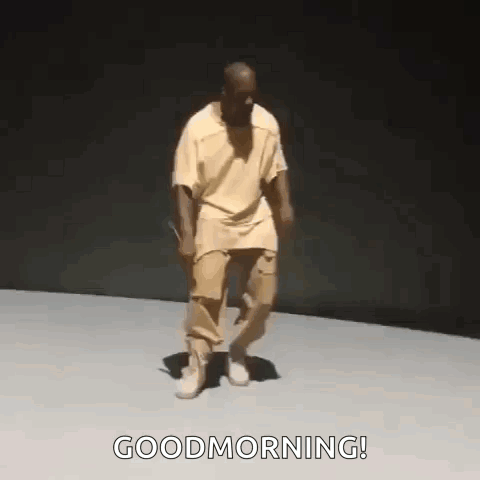 Man in Yellow Shirt and Khaki Pants Dances Good Morning