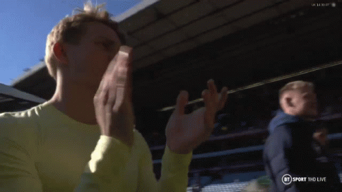 Man In Yellow Shirt Applauding In Front Of BT Sport HD Live Sign GIF