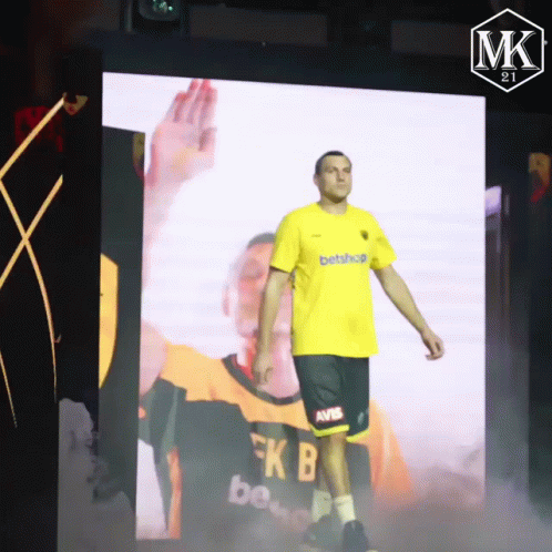 Man in Yellow Shirt BetShop