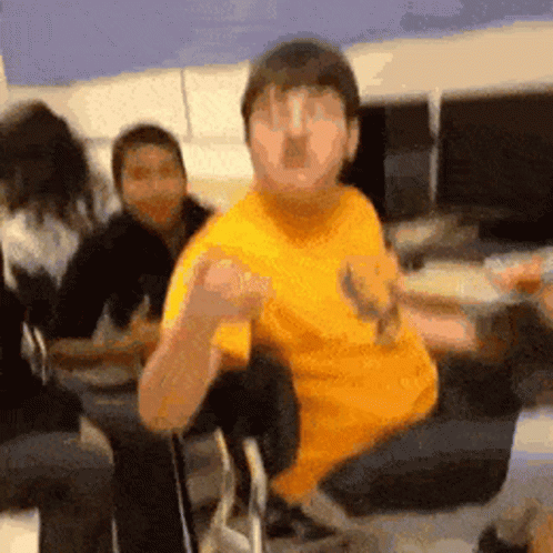 Man in Yellow Shirt Dancing
