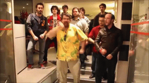 Man in Yellow Shirt Dancing With People