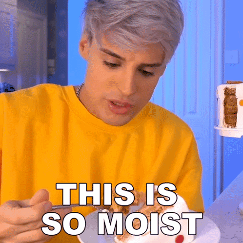Man in Yellow Shirt Eating Cake Saying This Is So Moist