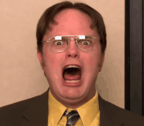 Man in Yellow Shirt Making Funny Face