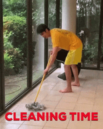 Man in Yellow Shirt Mopping Floor Saying Cleaning Time