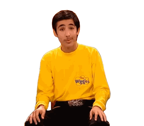 Man in Yellow Shirt Pointing