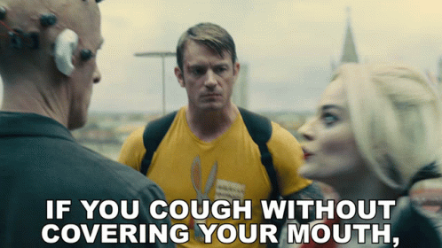 Man In Yellow Shirt Saying If You Cough Without Covering Mouth GIF